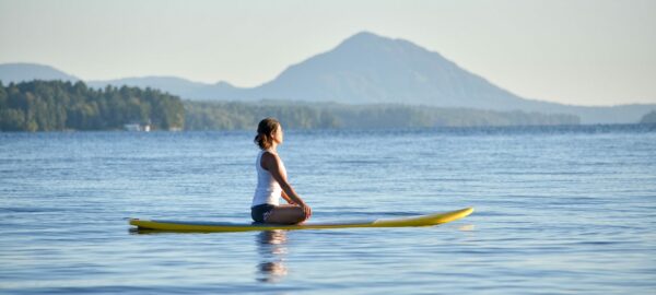 exciting activities, stand up paddle boarding woman