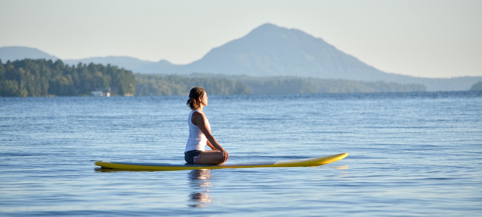 exciting activities, stand up paddle boarding woman