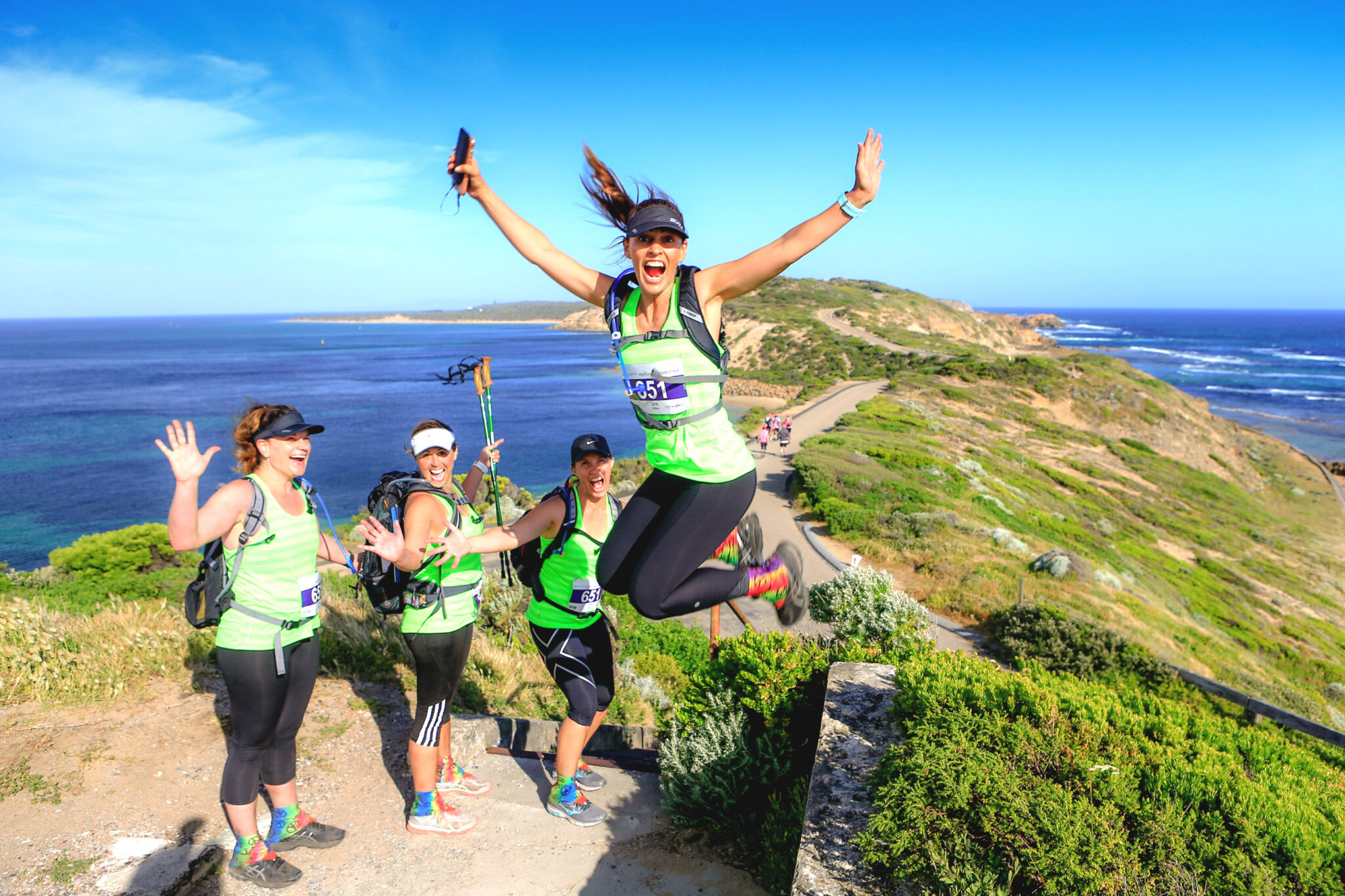 woman jumps infront of team at Mornington PeninsulaCoastrek